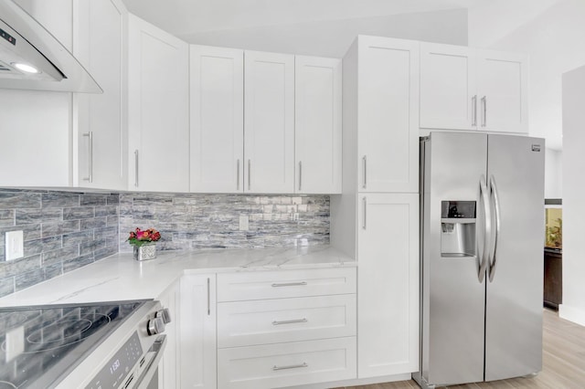 9640 Cherry Blossom Ct, Boynton Beach, FL 33437 - kitchen with stainless steel fridge with ice dispenser, exhaust hood, light stone countertops, white cabinets, and backsplash