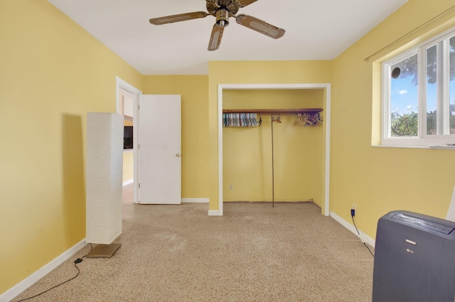 1115 S Seacrest Blvd, Boynton Beach, FL 33435 - unfurnished bedroom featuring carpet, a closet, baseboards, and a ceiling fan