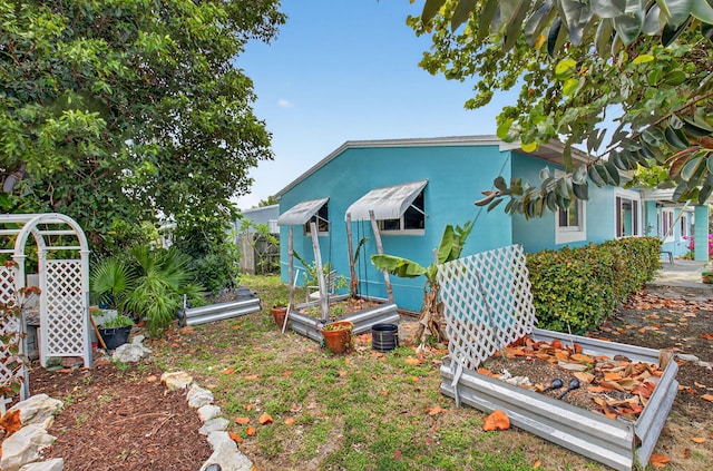 1115 S Seacrest Blvd, Boynton Beach, FL 33435 - view of yard featuring a vegetable garden