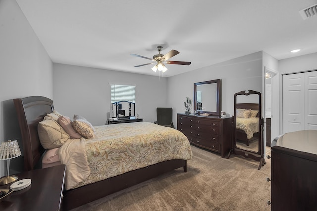 191 SW Glenwood Dr, Port Saint Lucie, FL 34984 - carpeted bedroom with a ceiling fan and a closet