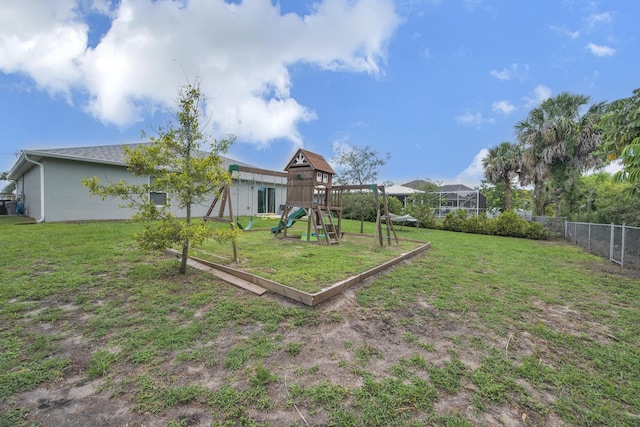 191 SW Glenwood Dr, Port Saint Lucie, FL 34984 - view of yard featuring a playground