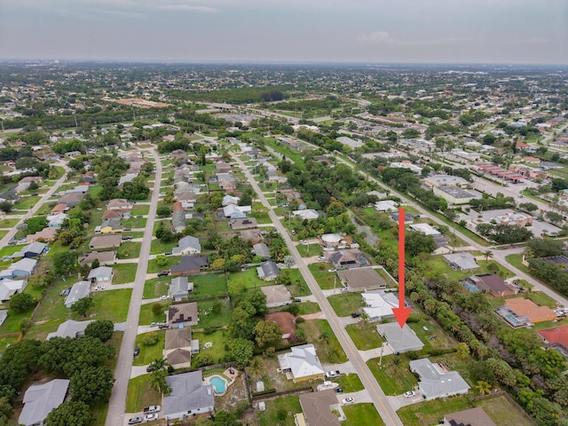 191 SW Glenwood Dr, Port Saint Lucie, FL 34984 - aerial view of property and surrounding area featuring nearby suburban area