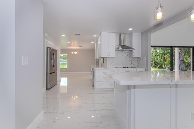 102 Granada St, Royal Palm Beach, FL 33411 - kitchen featuring wall chimney range hood, stainless steel fridge with ice dispenser, baseboards, black electric stovetop, and recessed lighting