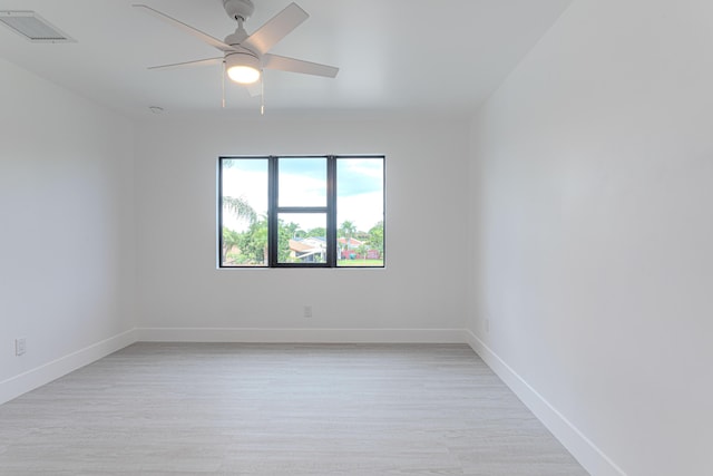 102 Granada St, Royal Palm Beach, FL 33411 - empty room featuring light wood-style flooring, baseboards, and a ceiling fan