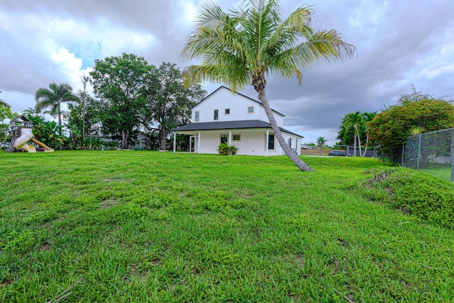 102 Granada St, Royal Palm Beach, FL 33411 - view of yard with a playground