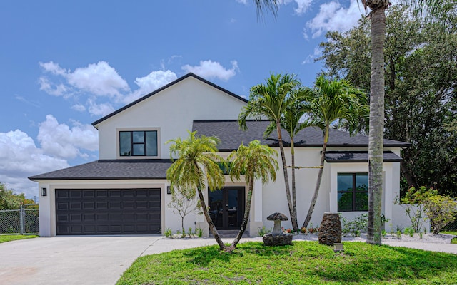 102 Granada St, Royal Palm Beach, FL 33411 - view of front of property with stucco siding, driveway, a garage, and a shingled roof