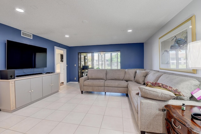 9692 Sills Dr E Unit 103, Boynton Beach, FL 33437 - living area with recessed lighting, a textured ceiling, and light tile patterned flooring