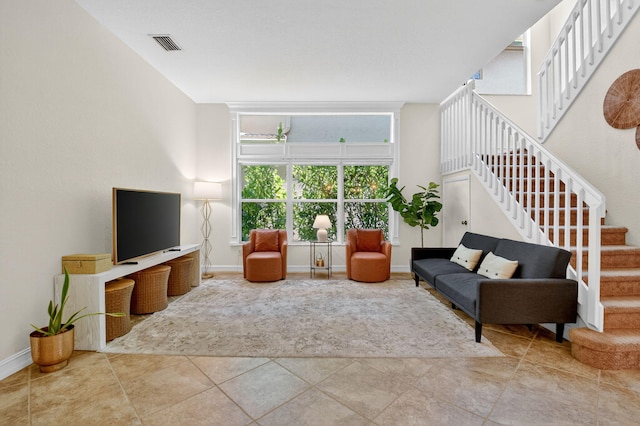 10608 Walnut Valley Dr, Boynton Beach, FL 33473 - living room with stairs and baseboards