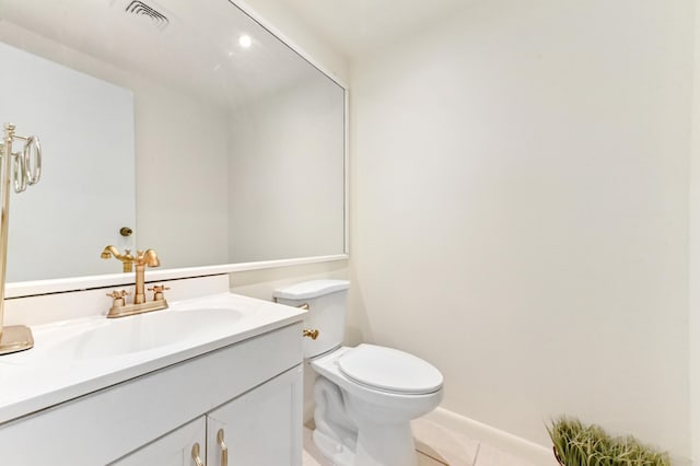 271 Saxony Unit F, Delray Beach, FL 33446 - half bathroom with vanity, tile patterned flooring, and toilet