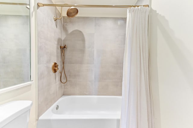 271 Saxony Unit F, Delray Beach, FL 33446 - bathroom with shower / bath combo with shower curtain and toilet