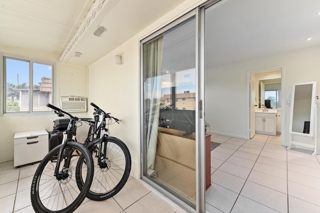 271 Saxony Unit F, Delray Beach, FL 33446 - sunroom / solarium with a sink and an AC wall unit