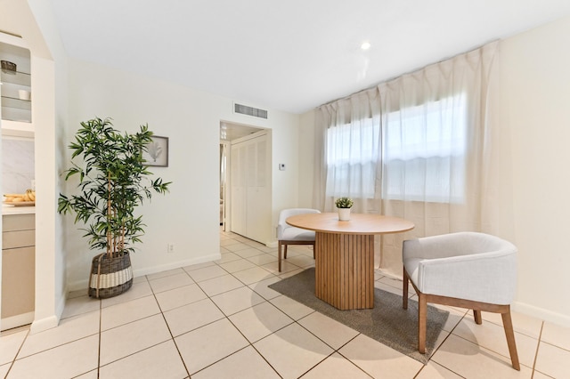 271 Saxony Unit F, Delray Beach, FL 33446 - dining room with baseboards and light tile patterned flooring
