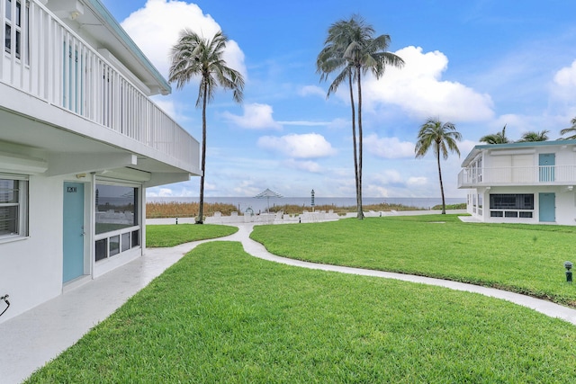 1470 S Ocean Blvd Unit 1101, Pompano Beach, FL 33062 - view of green lawn featuring a water view and a balcony