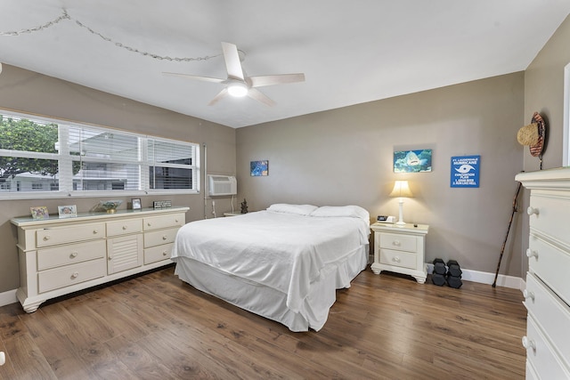 1470 S Ocean Blvd Unit 1101, Pompano Beach, FL 33062 - bedroom with wood finished floors, a wall mounted AC, and baseboards