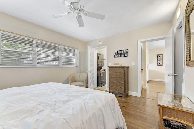 1470 S Ocean Blvd Unit 1101, Pompano Beach, FL 33062 - bedroom with light wood-style floors, multiple windows, baseboards, and a ceiling fan
