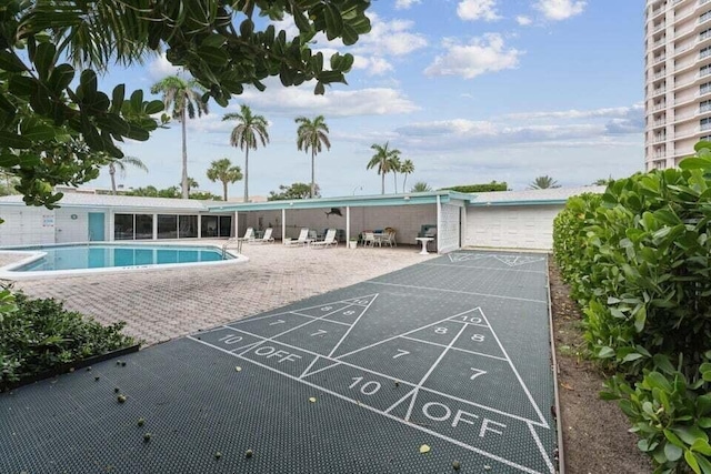 1470 S Ocean Blvd Unit 1101, Pompano Beach, FL 33062 - surrounding community with shuffleboard and a pool