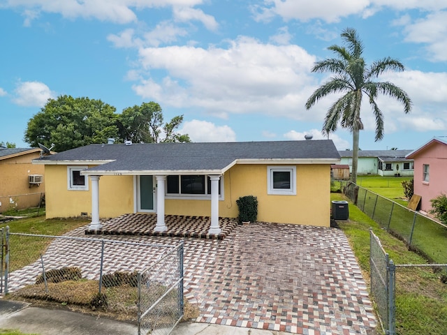 1528 Singletary Ave, Pahokee, FL 33476 - ranch-style house featuring stucco siding, central AC, and a shingled roof