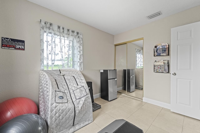 1528 Singletary Ave, Pahokee, FL 33476 - sitting room with baseboards and light tile patterned floors