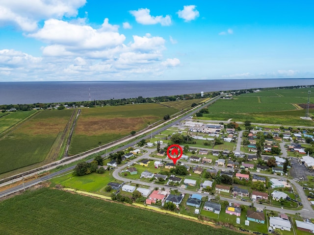1528 Singletary Ave, Pahokee, FL 33476 - aerial overview of property's location featuring a nearby body of water and nearby suburban area