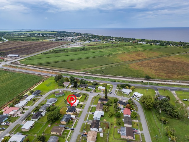1528 Singletary Ave, Pahokee, FL 33476 - aerial overview of property's location with a large body of water and rural landscape