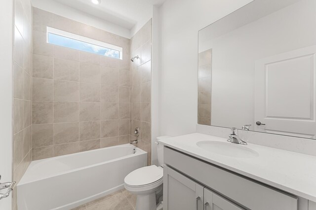 14408 SW Ellison Dr, Port Saint Lucie, FL 34987 - bathroom with vanity, toilet, shower / washtub combination, and tile patterned flooring