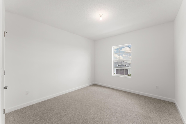 14408 SW Ellison Dr, Port Saint Lucie, FL 34987 - spare room with light colored carpet and baseboards