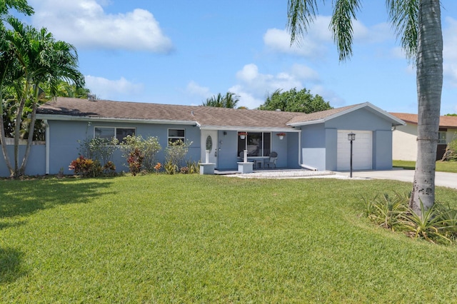 1056 SW 27th Ave, Boynton Beach, FL 33426 - ranch-style house featuring stucco siding, covered porch, a front lawn, driveway, and an attached garage