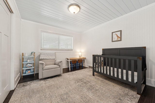 1056 SW 27th Ave, Boynton Beach, FL 33426 - bedroom with wooden ceiling, crown molding, a nursery area, and wood finished floors