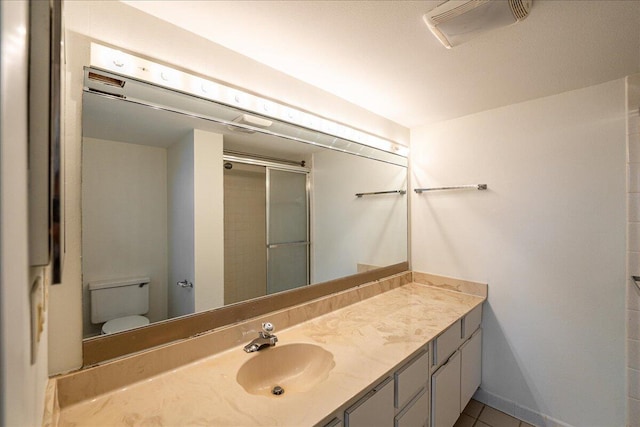 1950 SW Palm City Rd Unit 5109, Stuart, FL 34994 - bathroom with vanity, a shower with door, and tile patterned floors