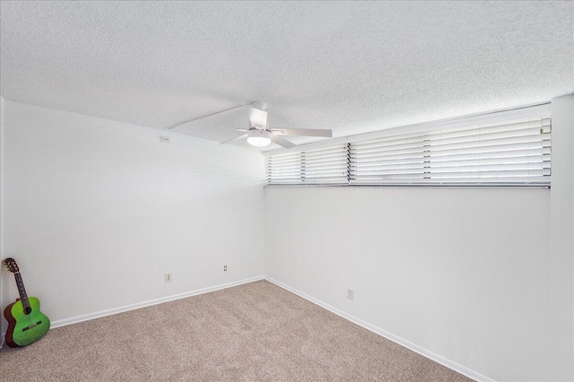 1950 SW Palm City Rd Unit 5109, Stuart, FL 34994 - empty room with ceiling fan, carpet flooring, and a textured ceiling