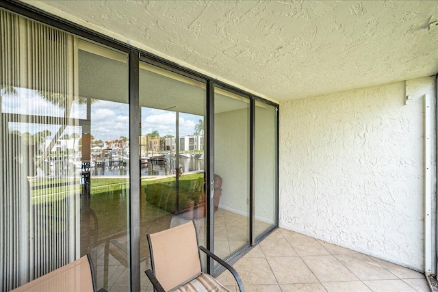 1950 SW Palm City Rd Unit 5109, Stuart, FL 34994 - unfurnished sunroom with a water view