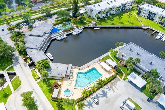 1950 SW Palm City Rd Unit 5109, Stuart, FL 34994 - drone / aerial view of a nearby body of water and a pool