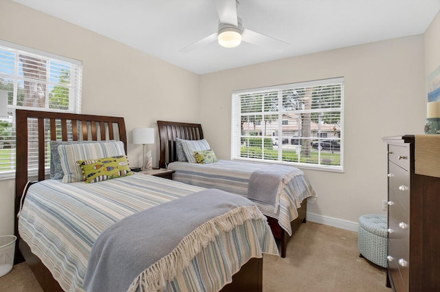 6736 Old Farm Trl, Boynton Beach, FL 33437 - carpeted bedroom with multiple windows, baseboards, and a ceiling fan