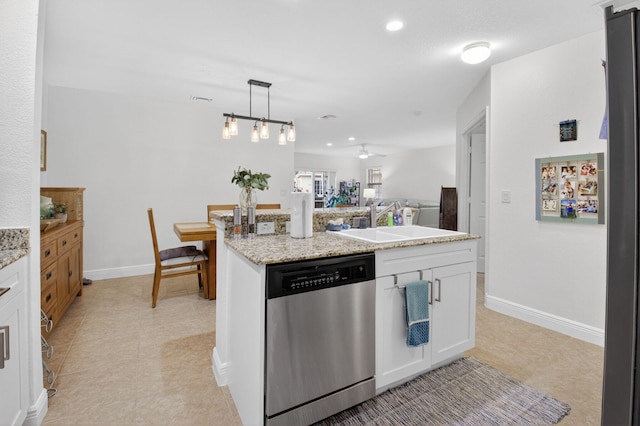 6736 Old Farm Trl, Boynton Beach, FL 33437 - kitchen featuring dishwasher, a sink, white cabinetry, baseboards, and light stone counters