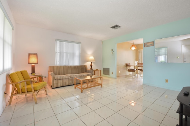 1916 SW 19th St, Boynton Beach, FL 33426 - living room with plenty of natural light and light tile patterned floors