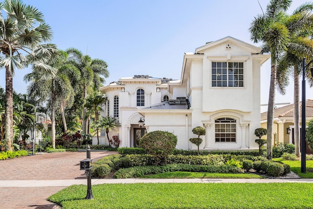 16414 Braeburn Ridge Trl, Delray Beach, FL 33446 - view of front facade featuring stucco siding and decorative driveway