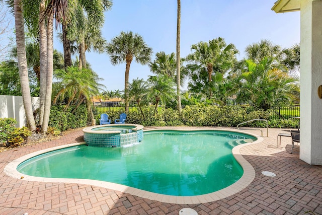 16414 Braeburn Ridge Trl, Delray Beach, FL 33446 - view of swimming pool with a fenced backyard, a pool with connected hot tub, and a patio area