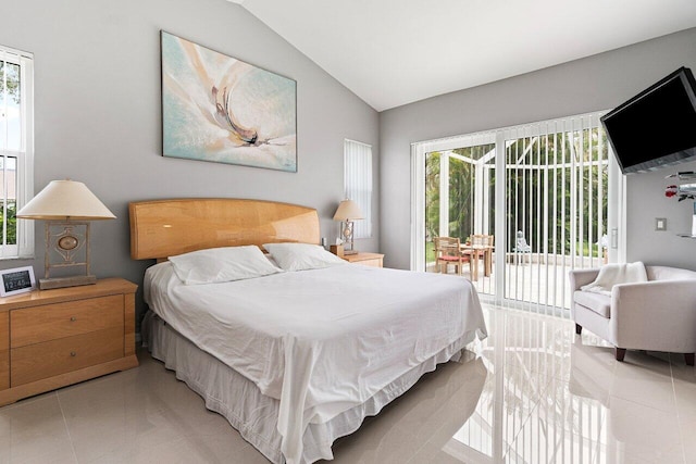 137 N Lakeshore Dr, Hypoluxo, FL 33462 - bedroom featuring access to exterior, lofted ceiling, multiple windows, and light tile patterned flooring