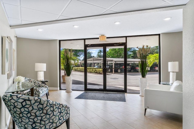 137 N Lakeshore Dr, Hypoluxo, FL 33462 - lobby with floor to ceiling windows and recessed lighting