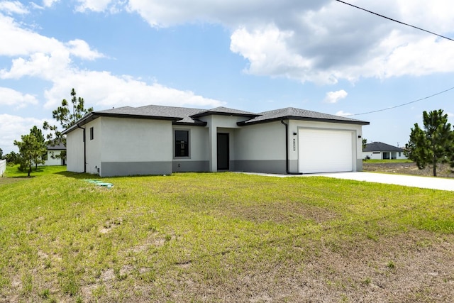 4209 25th St SW, Lehigh Acres, FL 33976 - prairie-style home with stucco siding, driveway, a garage, and a front lawn