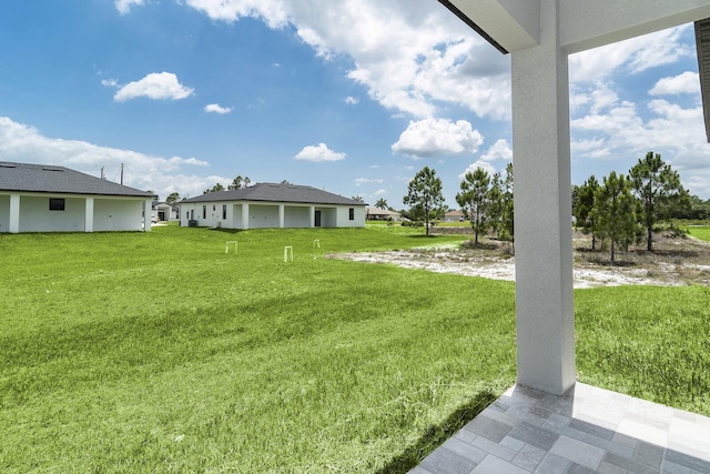 4209 25th St SW, Lehigh Acres, FL 33976 - view of grassy yard featuring a residential view
