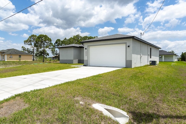 4209 25th St SW, Lehigh Acres, FL 33976 - view of side of property with stucco siding, central AC unit, a lawn, and driveway
