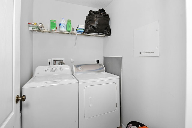 2186 SE Destin Dr, Port Saint Lucie, FL 34952 - washroom with washing machine and dryer