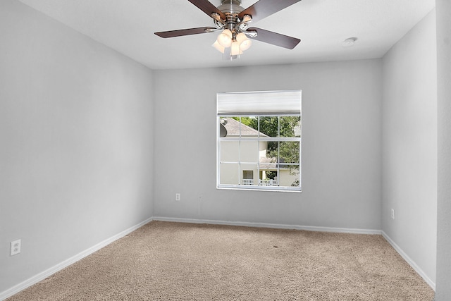 2186 SE Destin Dr, Port Saint Lucie, FL 34952 - empty room with carpet flooring, ceiling fan, and baseboards