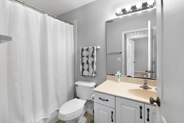 2186 SE Destin Dr, Port Saint Lucie, FL 34952 - bathroom with vanity, toilet, and curtained shower