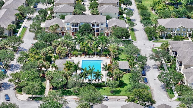 2186 SE Destin Dr, Port Saint Lucie, FL 34952 - aerial view of property and surrounding area with nearby suburban area and a pool