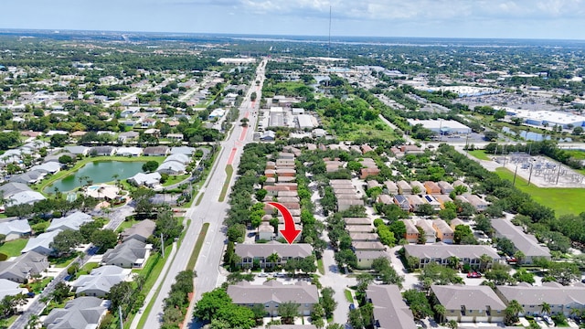 2186 SE Destin Dr, Port Saint Lucie, FL 34952 - aerial overview of property's location featuring nearby suburban area and a nearby body of water