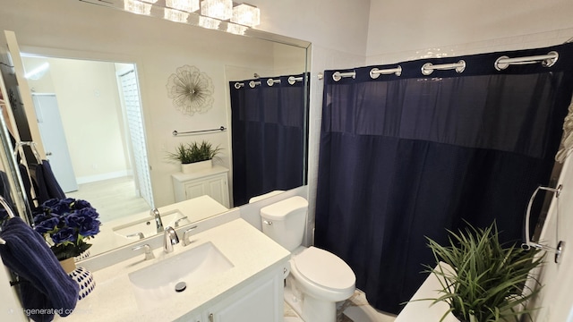 9587 Weldon Cir Unit B414, Tamarac, FL 33321 - full bathroom featuring vanity, toilet, and curtained shower