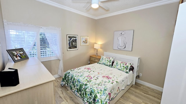 9587 Weldon Cir Unit B414, Tamarac, FL 33321 - bedroom featuring light wood-style floors, ornamental molding, baseboards, and a ceiling fan