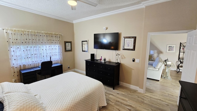 9587 Weldon Cir Unit B414, Tamarac, FL 33321 - bedroom with crown molding, baseboards, light wood-style floors, and a textured ceiling